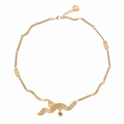 Artystyczny naszyjnik z zawieszką i czerwonym kryształem z kolekcji Holos