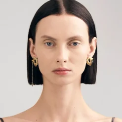 Asymetryczne, pozłacane kolczyki z meteorytem z kolekcji Meteoros