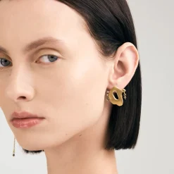 Asymetryczne, pozłacane kolczyki z meteorytem z kolekcji Meteoros