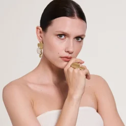 Asymetryczne, srebrno-złote kolczyki z kolekcji Rundo