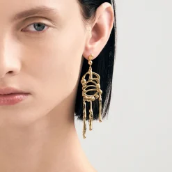 Długie, pozłacane kolczyki na biglu z meteorytem z kolekcji Meteoros