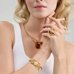 Geometryczna, pozłacana bransoletka z bursztynem z kolekcji Baltica