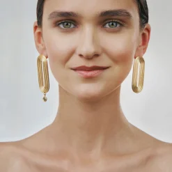 Owalne kolczyki z szarym kryształem z kolekcji Holos