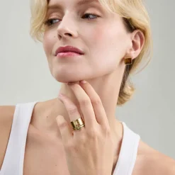 Podwójny, pozłacany pierścionek z bursztynem z kolekcji Baltica