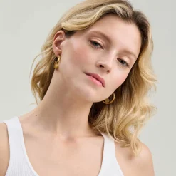 Pozłacane kolczyki koła z bursztynem z kolekcji Baltica