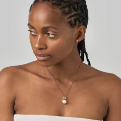 Srebrny naszyjnik z perłą i surowym diamentem z kolekcji Verum