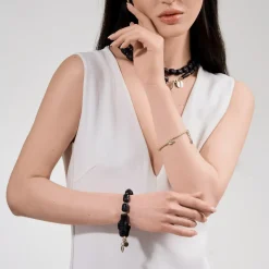 Sztywna, pozłacana bransoletka z wężem z kolekcji Kembali