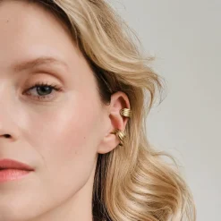 Złota nausznica Basic z kolekcji Holos