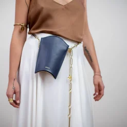 Złota zawieszka do torebki z koniczynką